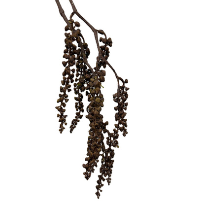 Decorative branch with hanging leaves on a white background