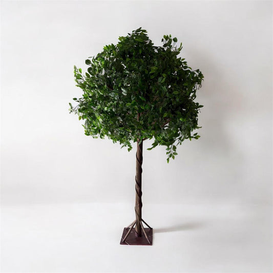 Artificial tree with green leaves on a white background