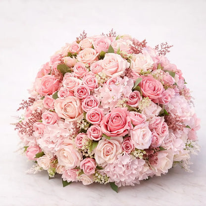 Bouquet of pink and white flowers on a light background