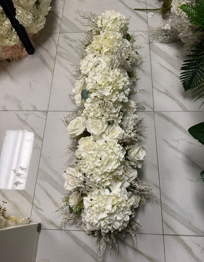 Floral arrangement on a marble floor
